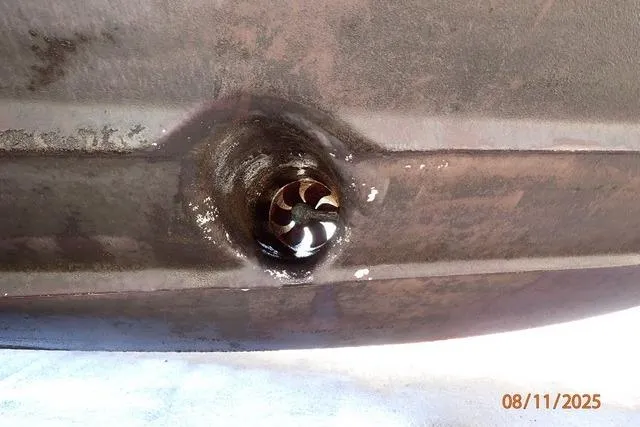  Yacht Photos Pics Bottom view of 2003 Sea Ray 460 Sundancer boat hull with visible propeller.