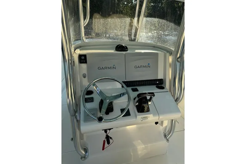  Yacht Photos Pics 2014 Jupiter 34 boat helm with Garmin navigation system and steering wheel.