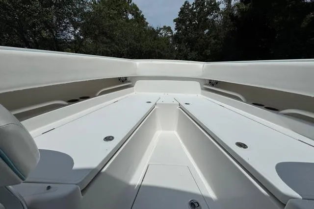  Yacht Photos Pics 2014 Jupiter 34 boat interior with spacious seating and storage compartments.