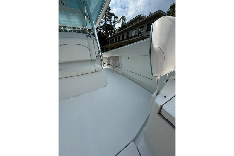  Yacht Photos Pics 2014 Jupiter 34 boat interior with white seating and sleek design.