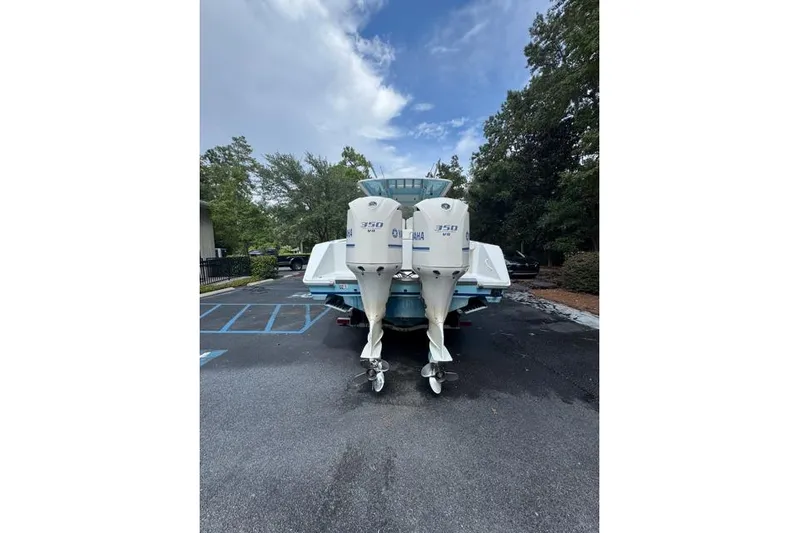  Yacht Photos Pics 2014 Jupiter 34 boat with twin Yamaha 350 engines parked outdoors.