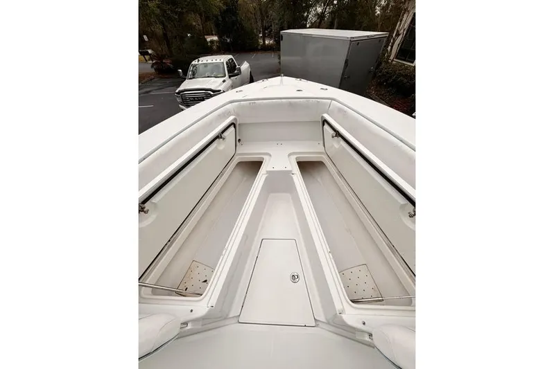  Yacht Photos Pics 2014 Jupiter 34 boat interior with open storage compartments.