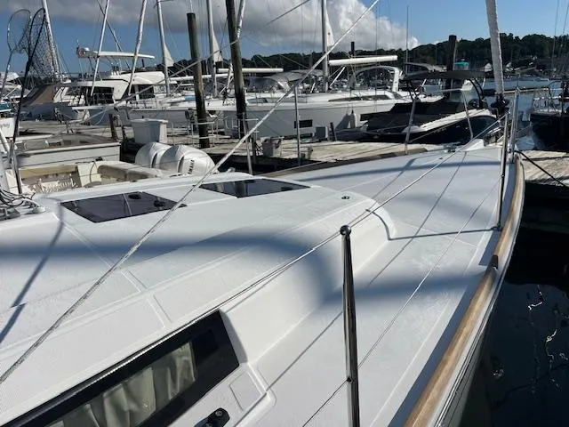 Nansea I Yacht Photos Pics 2017 Beneteau Oceanis 38.1 sailboat docked at marina, showcasing sleek deck design.