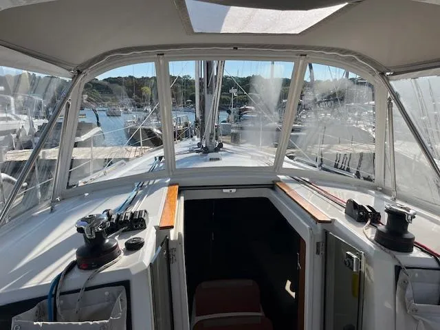 Nansea I Yacht Photos Pics 2017 Beneteau Oceanis 38.1 sailboat cockpit view, docked at marina.