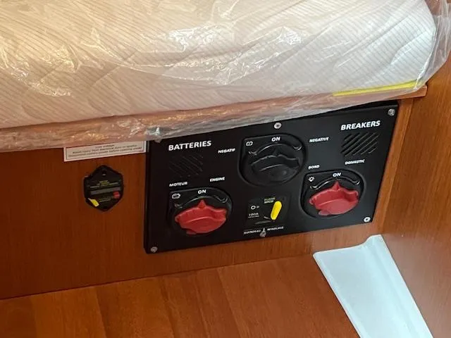 Nansea I Yacht Photos Pics Control panel on a 2017 Beneteau Oceanis 38.1 yacht, featuring battery and breaker switches.