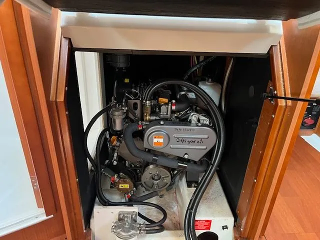 Nansea I Yacht Photos Pics Engine compartment of a 2017 Beneteau Oceanis 38.1 sailboat, showcasing mechanical components.