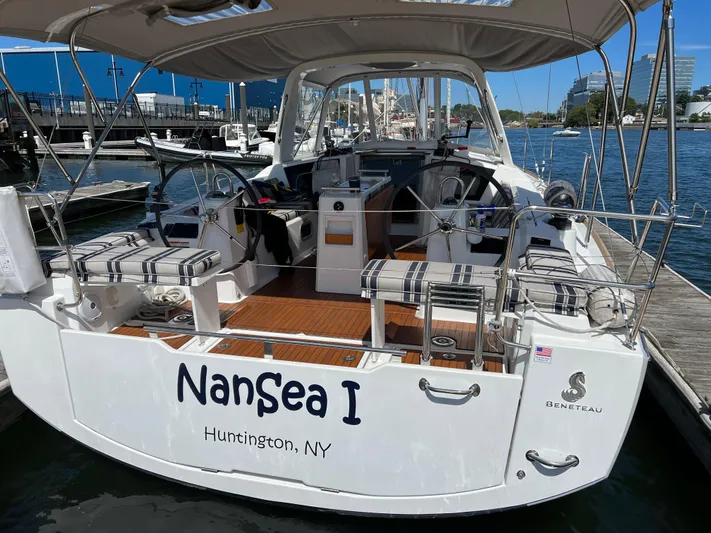 Nansea I Yacht Photos Pics 2017 Beneteau Oceanis 38.1 docked, featuring dual steering wheels and spacious cockpit in Huntington, NY.