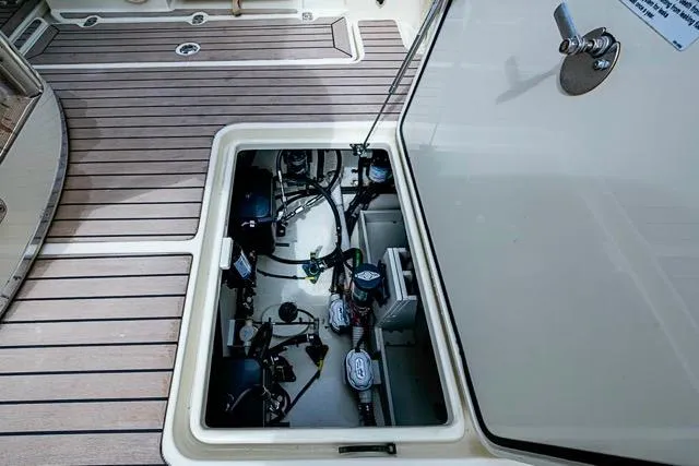  Yacht Photos Pics 2019 Chris-Craft Catalina 30 engine compartment with open hatch, showcasing mechanical components.