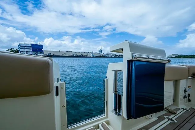  Yacht Photos Pics 2019 Chris-Craft Catalina 30 boat with open deck view, overlooking calm waters and blue sky.