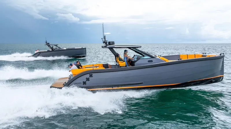  Yacht Photos Pics 2024 Lekker 44 boats cruising on open water, showcasing sleek design and performance.