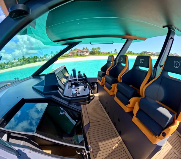  Yacht Photos Pics Interior of 2024 Lekker 44 boat with modern seating and scenic ocean view.