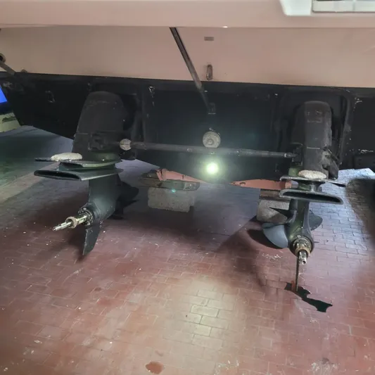  Yacht Photos Pics 2016 Cranchi Z35 boat stern with dual propellers on a tiled floor.