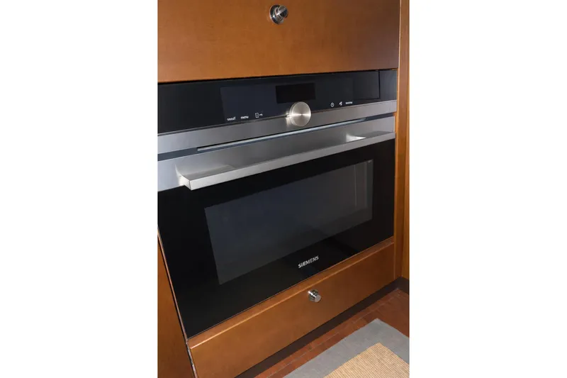  Yacht Photos Pics Built-in Siemens oven in 2018 Beneteau Swift Trawler 50 kitchen.