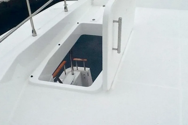  Yacht Photos Pics Hatch on 2018 Beneteau Swift Trawler 50, showcasing sleek design and functionality.