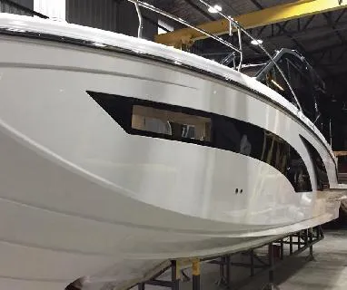 Ready For Immediate Delivery Yacht Photos Pics 2025 Hanover 387 Outboard Classic Luxury Edition boat in a showroom.