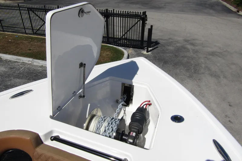  Yacht Photos Pics 2025 Sea Pro 322 Offshore anchor locker with open hatch and visible winch system.