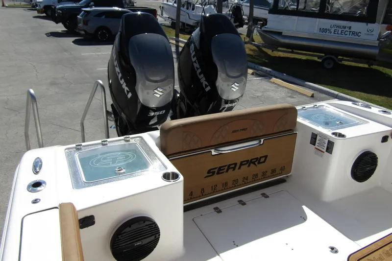 Yacht Photos Pics 2025 Sea Pro 322 Offshore boat with dual Suzuki 350 engines, docked in a marina.