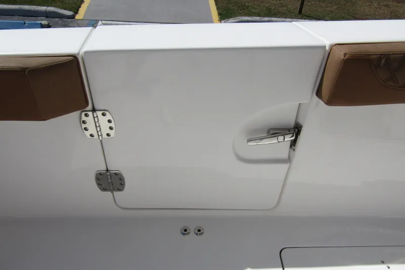  Yacht Photos Pics 2025 Sea Pro 322 Offshore boat door with brown cushioned seating and stainless steel latch.