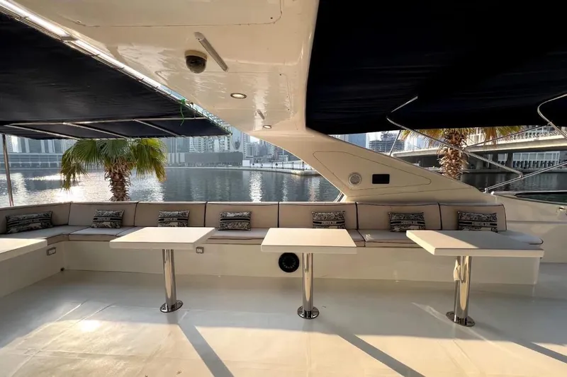  Yacht Photos Pics Luxurious seating area on 2013 Gulf Craft Majesty 86 yacht with waterfront view.