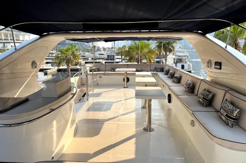  Yacht Photos Pics Luxurious 2013 Gulf Craft Majesty 86 yacht interior with elegant seating and marina view.