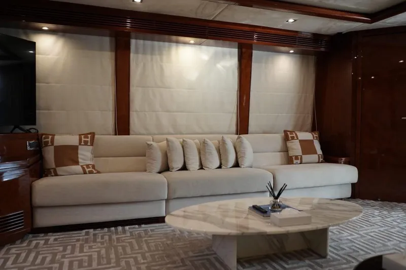  Yacht Photos Pics Luxurious interior of 2013 Gulf Craft Majesty 86 yacht with elegant sofa and marble table.