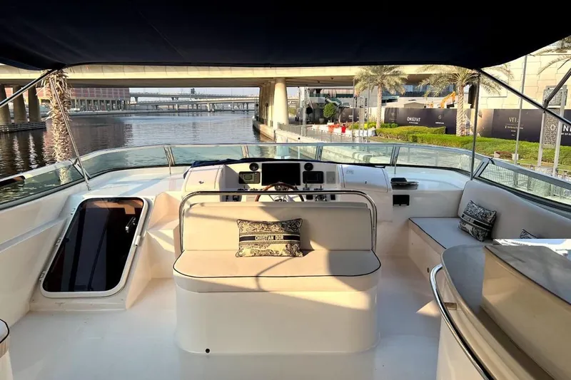  Yacht Photos Pics Luxurious 2013 Gulf Craft Majesty 86 yacht interior with elegant seating and scenic waterfront view.