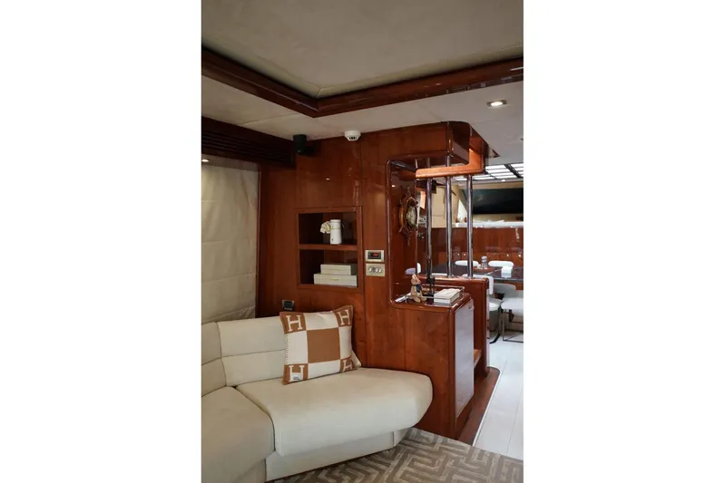  Yacht Photos Pics Luxurious interior of 2013 Gulf Craft Majesty 86 yacht with elegant wood finishes.