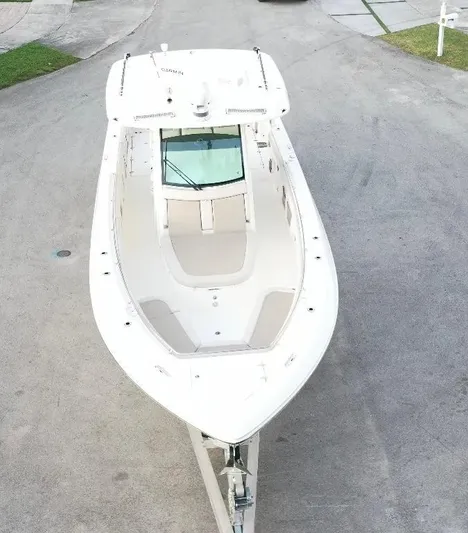  Yacht Photos Pics 2021 Boston Whaler 350 Outrage boat, aerial view, docked on pavement.
