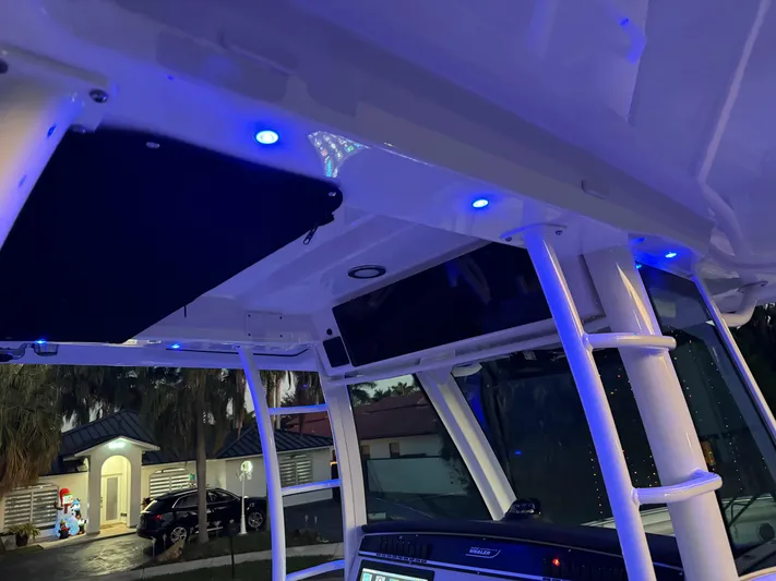 Yacht Photos Pics Interior view of 2021 Boston Whaler 350 Outrage with blue LED lights.