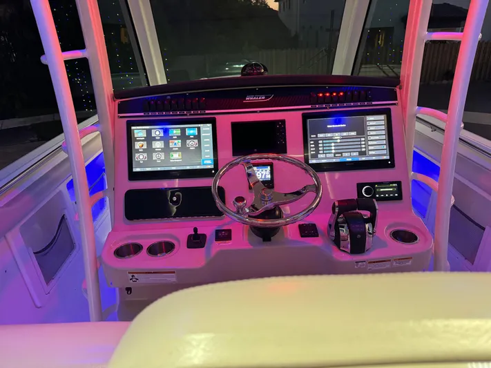  Yacht Photos Pics 2021 Boston Whaler 350 Outrage helm with dual displays and illuminated controls.