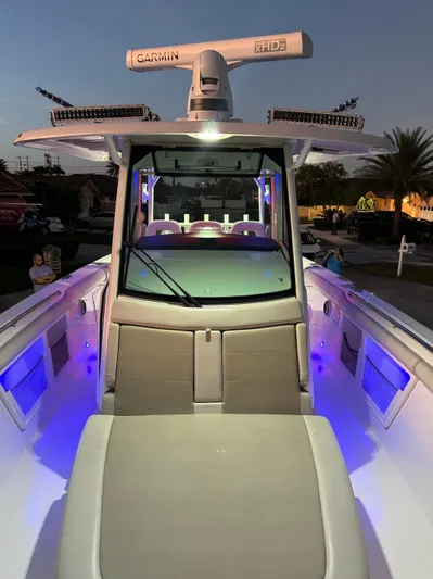  Yacht Photos Pics 2021 Boston Whaler 350 Outrage boat with illuminated deck and advanced Garmin radar.