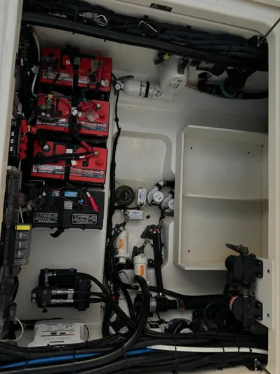  Yacht Photos Pics 2021 Boston Whaler 350 Outrage engine compartment with batteries and wiring.
