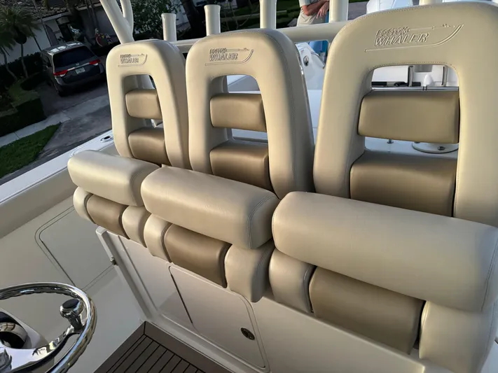  Yacht Photos Pics Boston Whaler 350 Outrage 2021 model with luxurious seating arrangement.
