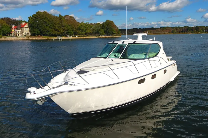 Ost - 39044 Yacht Photos Pics 2008 Tiara Yachts 3900 Sovran cruising on a scenic lake.