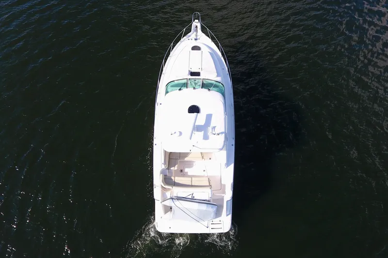 Ost - 39044 Yacht Photos Pics Aerial view of 2008 Tiara Yachts 3900 Sovran cruising on water.