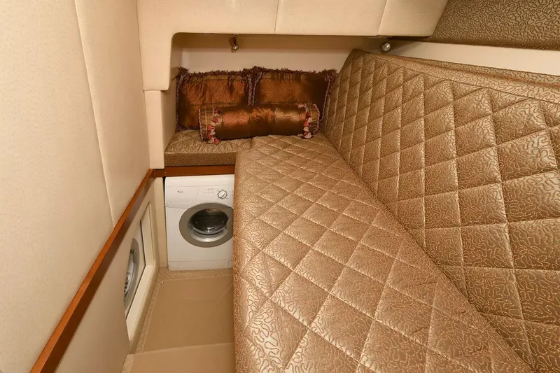 Chirstina Maria Yacht Photos Pics Luxurious cabin interior of 2009 Silverton 52 Ovation yacht with elegant seating and built-in washer.