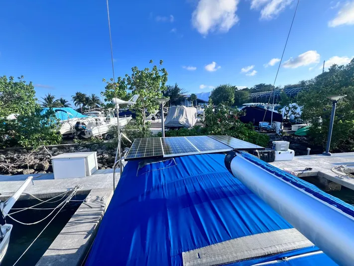  Yacht Photos Pics Beneteau America Oceanis 41 sailboat with solar panels docked at marina, 2009 model.