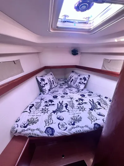  Yacht Photos Pics 2009 Beneteau America Oceanis 41 cabin with nautical-themed bedding.