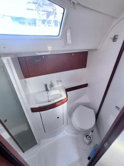 Yacht Photos Pics Beneteau America Oceanis 41 2009 yacht bathroom with sink, toilet, and storage.