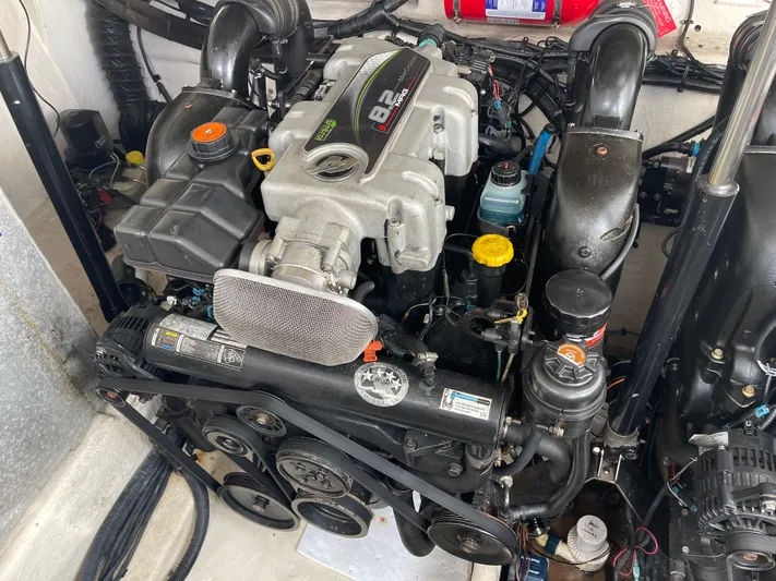 Hanky Panky Yacht Photos Pics Engine of a 2012 Sea Ray 350 Sundancer boat, detailed view.