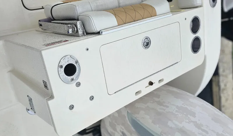  Yacht Photos Pics 2016 World Cat 320 boat interior with seating and storage compartment.