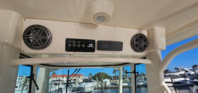  Yacht Photos Pics 2016 World Cat 320 boat interior with audio system and marina view.
