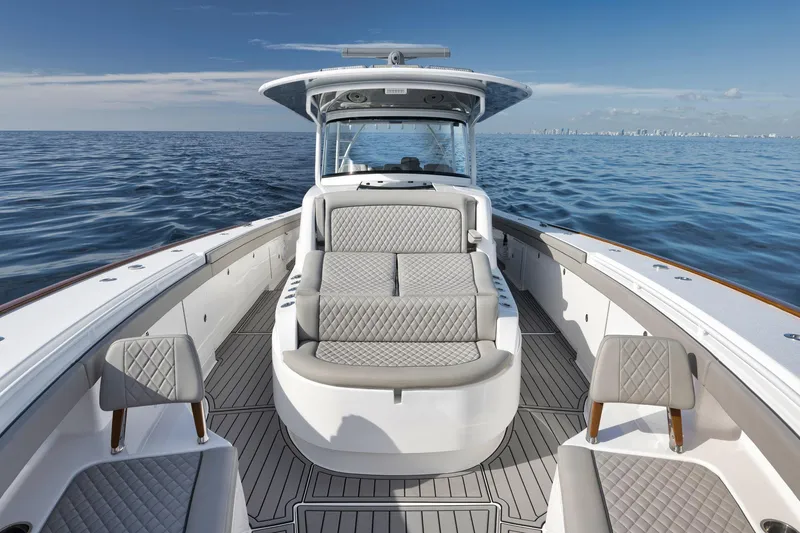  Yacht Photos Pics 2024 Valhalla Boatworks V-46 on open water, featuring luxurious seating and sleek design.