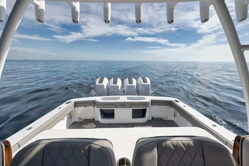  Yacht Photos Pics 2024 Valhalla Boatworks V-46 on open sea, showcasing powerful engines and sleek design.