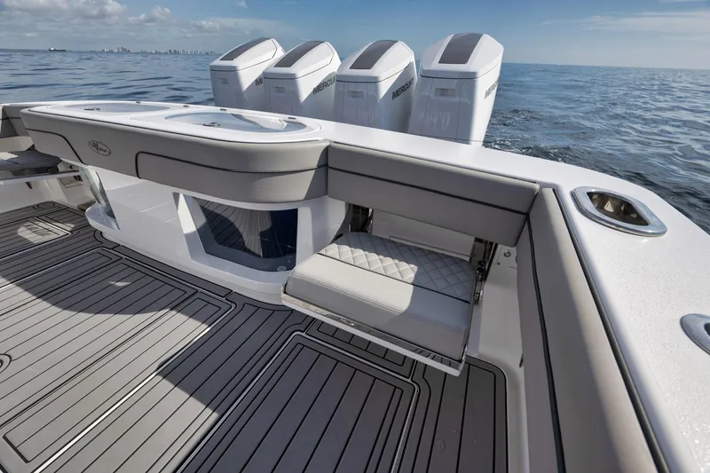  Yacht Photos Pics 2024 Valhalla Boatworks V-46, sleek deck design, powerful engines, open sea view.