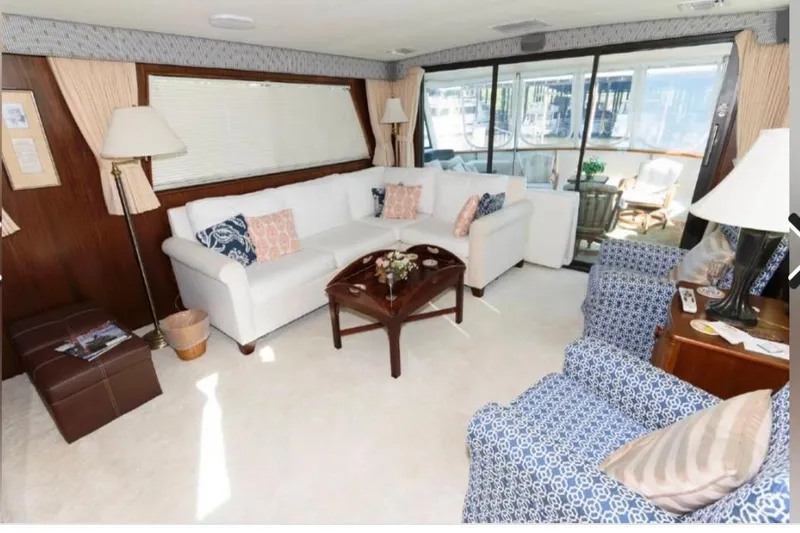  Yacht Photos Pics Luxurious interior of 1988 Hatteras 54 Motor Yacht with elegant seating and decor.