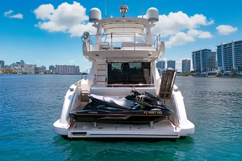 Ll On The Rocks Yacht Photos Pics Azimut Fly 53 yacht with jet ski, 2012 model, docked in a scenic waterfront location.