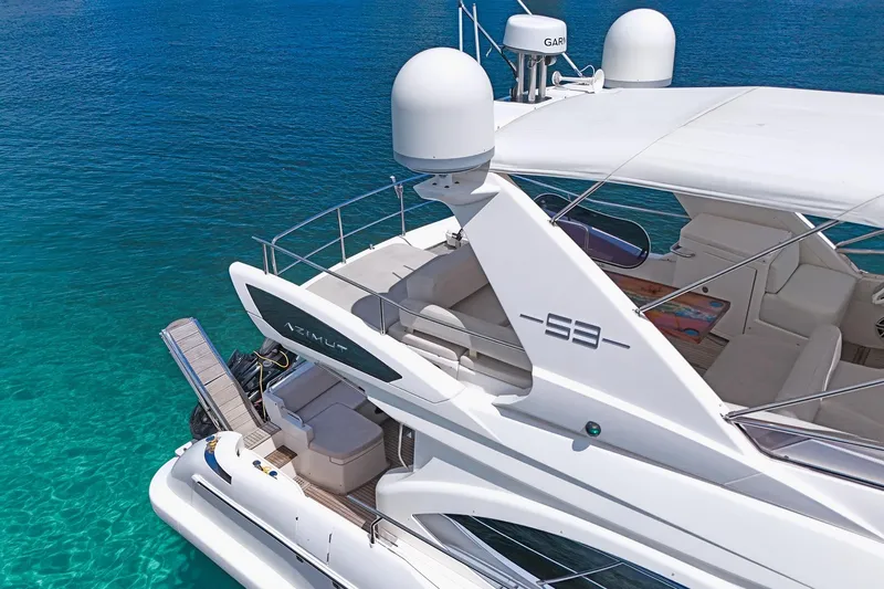 Ll On The Rocks Yacht Photos Pics Azimut Fly 53 yacht, 2012 model, docked in clear turquoise waters.