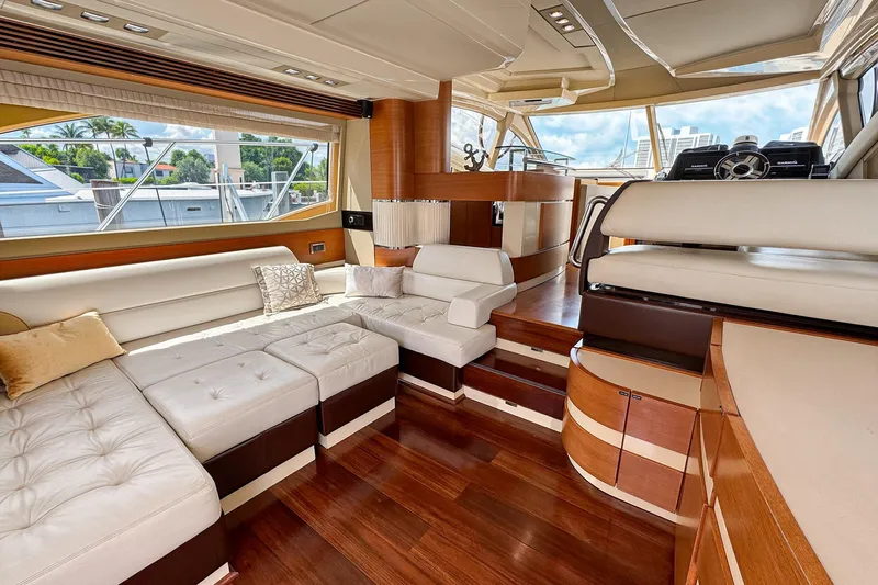 Ll On The Rocks Yacht Photos Pics Luxurious interior of 2012 Azimut Fly 53 yacht with elegant seating and wooden flooring.