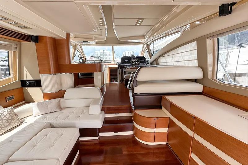 Ll On The Rocks Yacht Photos Pics Luxurious interior of 2012 Azimut Fly 53 yacht with elegant seating and wood finishes.